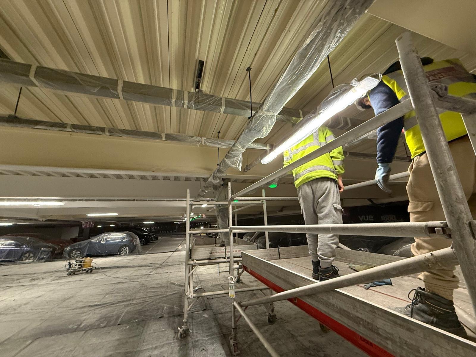 Protected services and beam preparation prior to painting