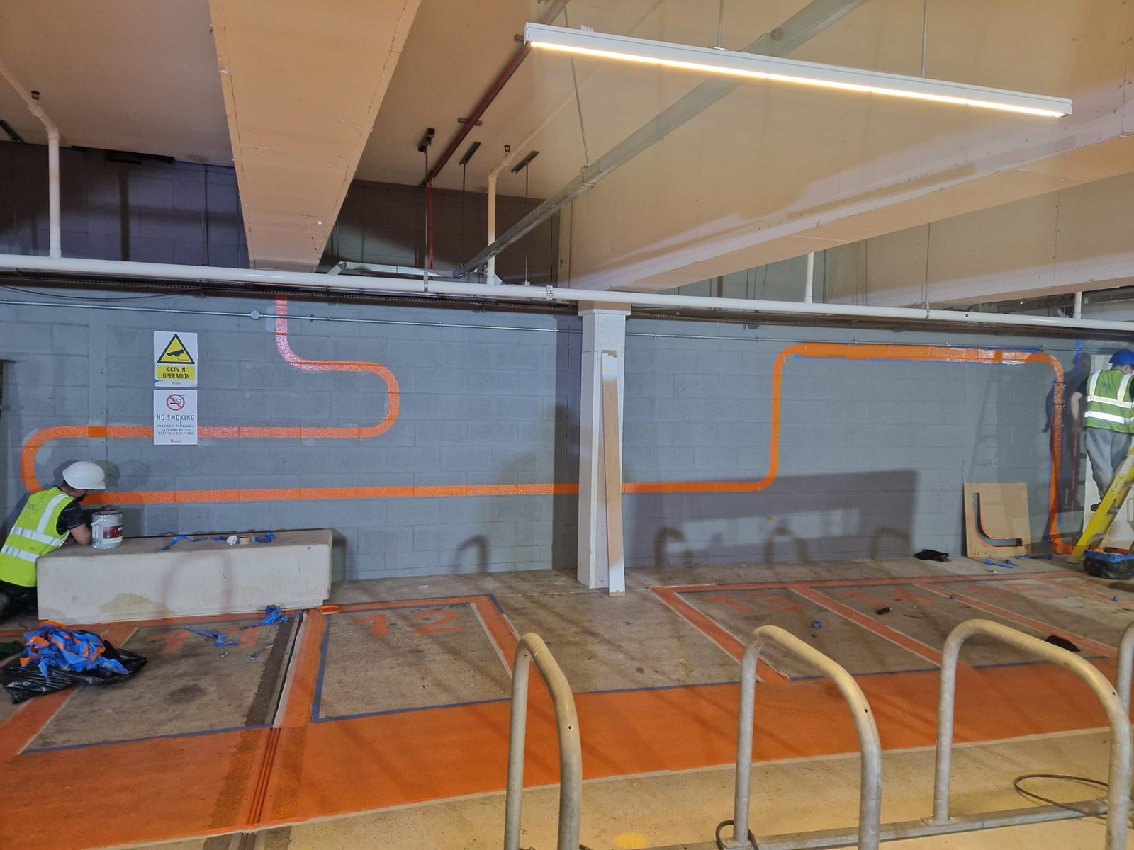 Orange wave pattern wall demarcation in progress