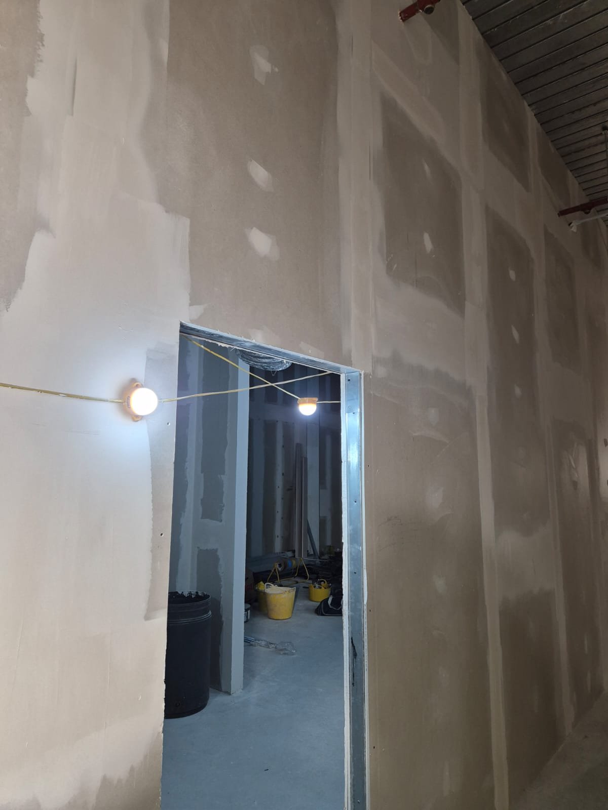 Plastered partitions and new doorway inside Omega unit