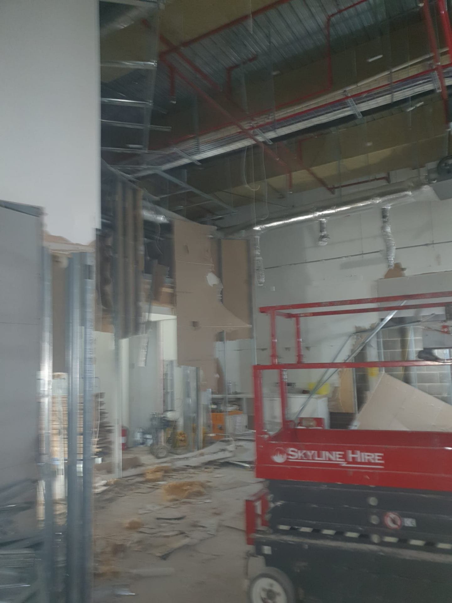 Strip-out and overhead services exposed during demolition