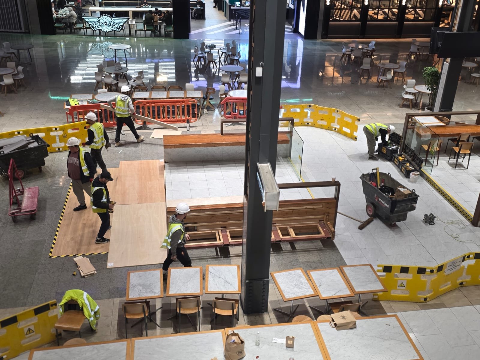 ECL crew laying new timber flooring overnight